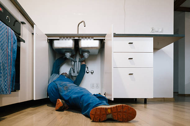 Professional Drain Cleaning technician working in Livingston, NY